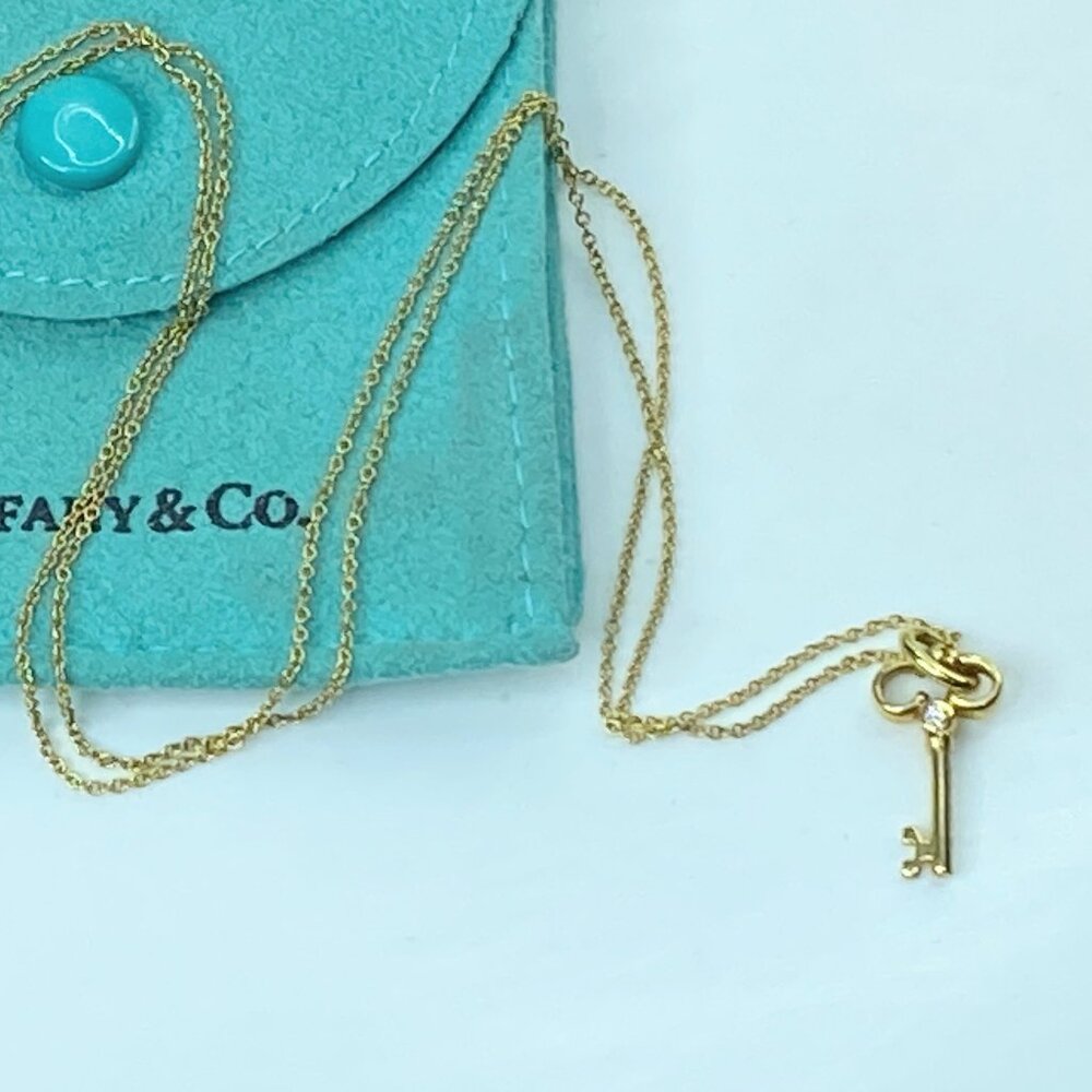 Tiffany & Co. 18K yellow gold Diamond Key pendant necklace 3.3g 24.25" JR930